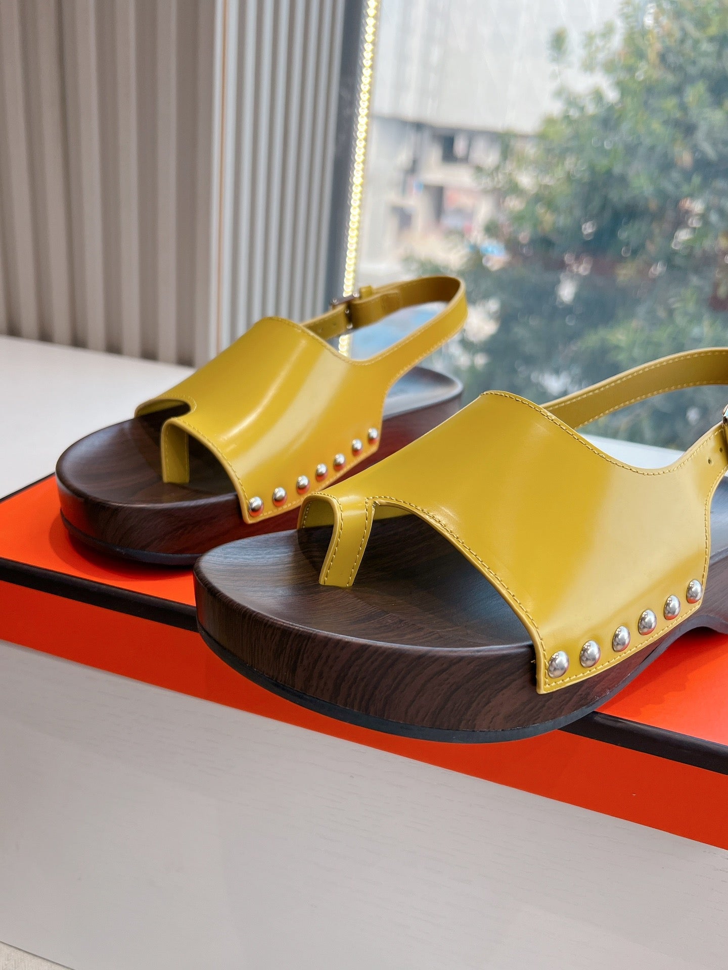 HERMES FLAT SANDAL IN CORN YELLOW CALFSKIN