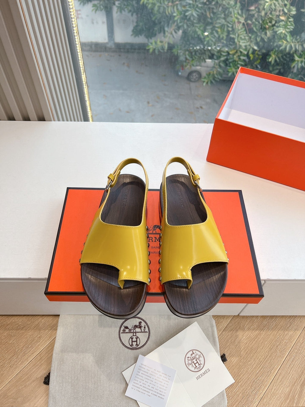 HERMES FLAT SANDAL IN CORN YELLOW CALFSKIN