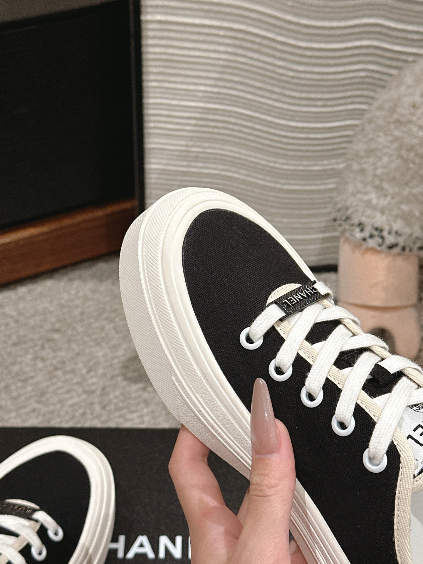 CHANEL LACE-UP SNEAKERS IN BLACK CANVAS