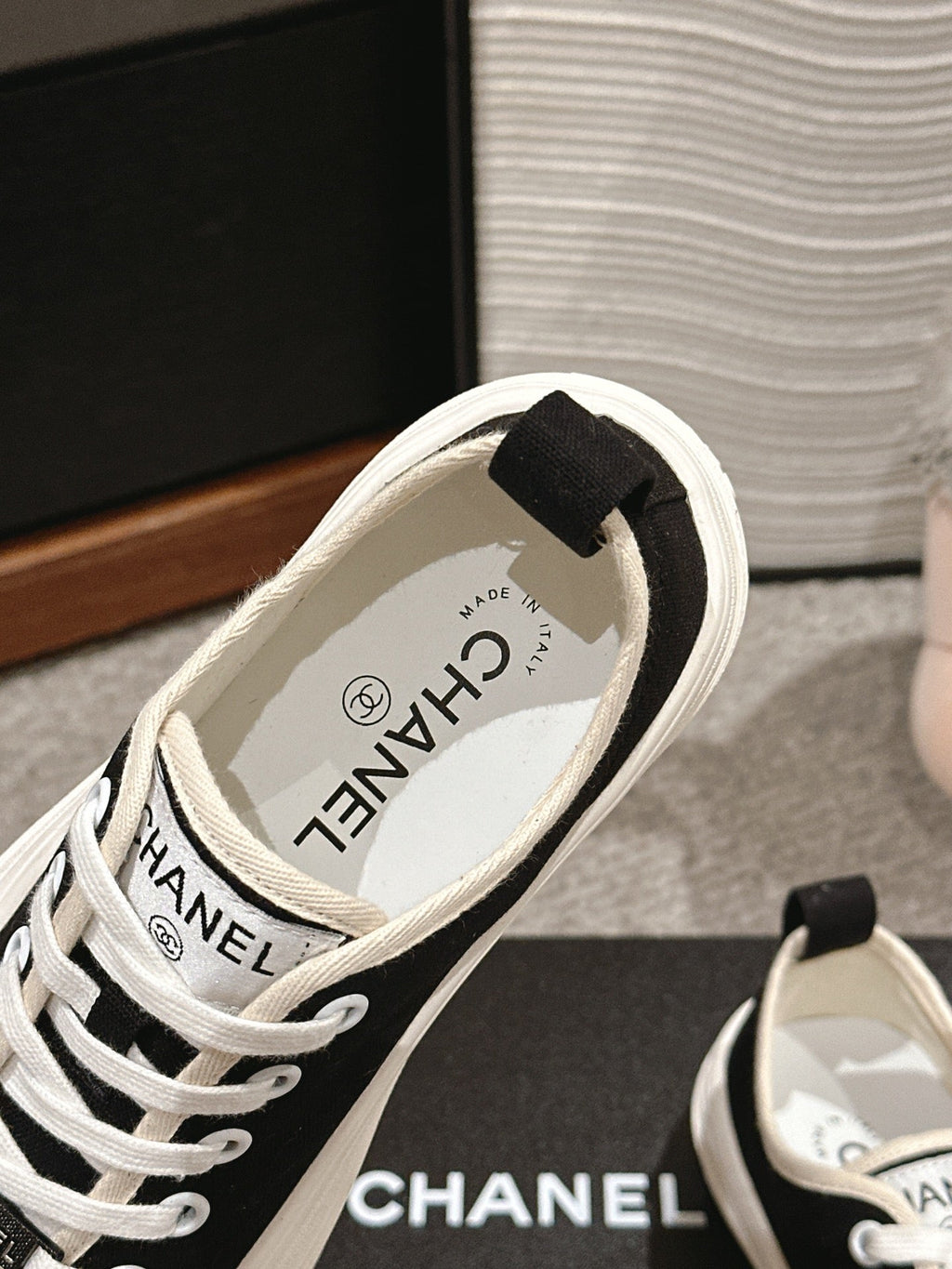 CHANEL LACE-UP SNEAKERS IN BLACK CANVAS
