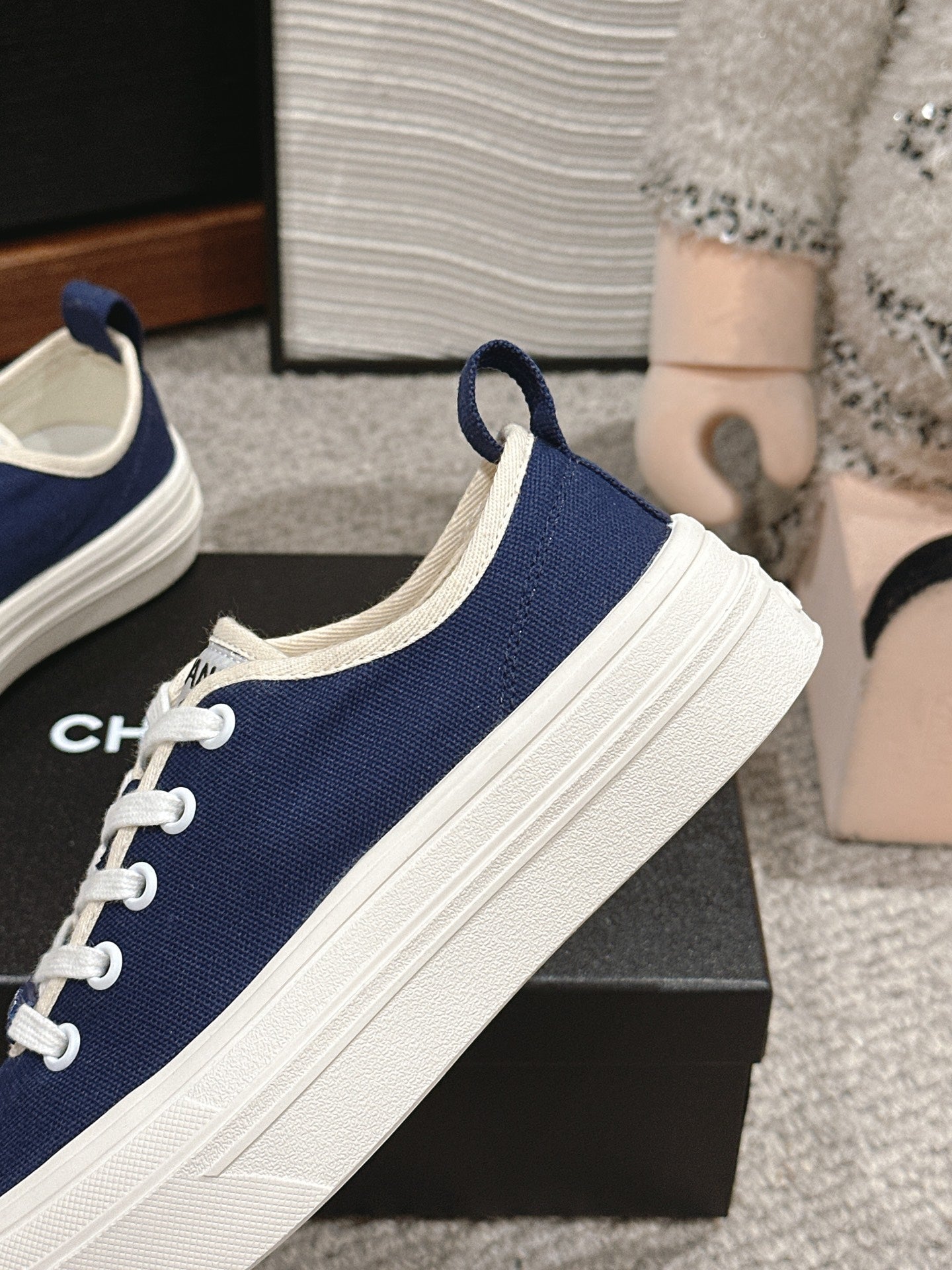 CHANEL LACE-UP SNEAKERS IN NAVY BLUE CANVAS