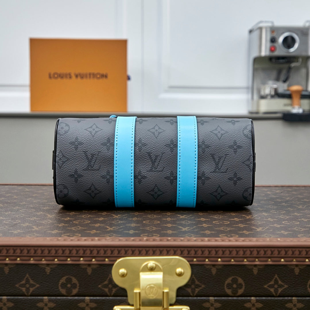 LOUIS VUITTON KEEPALL BANDOULIÈRE 25 IN GUN METAL MONOGRAM ECLIPSE CANVAS MIX TURQUOISE CALFSKIN