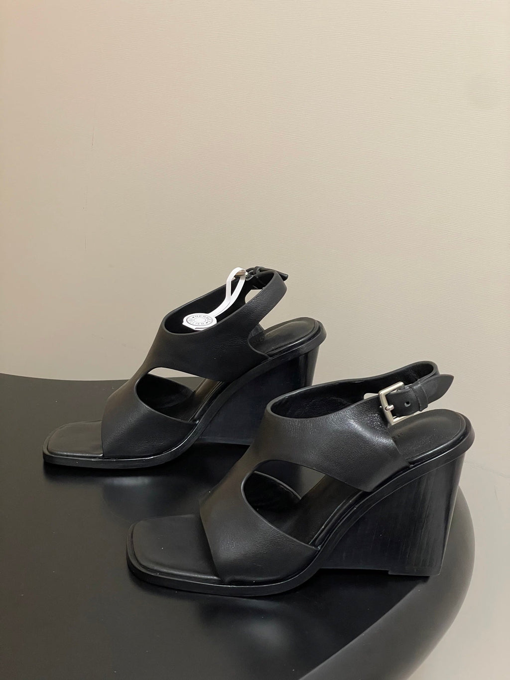 HERMES 25S KALYA WEDGE SANDAL 100 MM IN BLACK LAMBSKIN