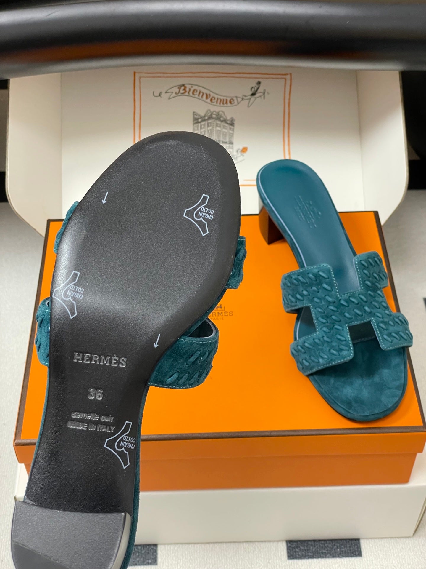 HERMES 25S ORAN HIGH‑HEEL SANDAL IN DARK BLUE SUEDE AND LAMBSKIN