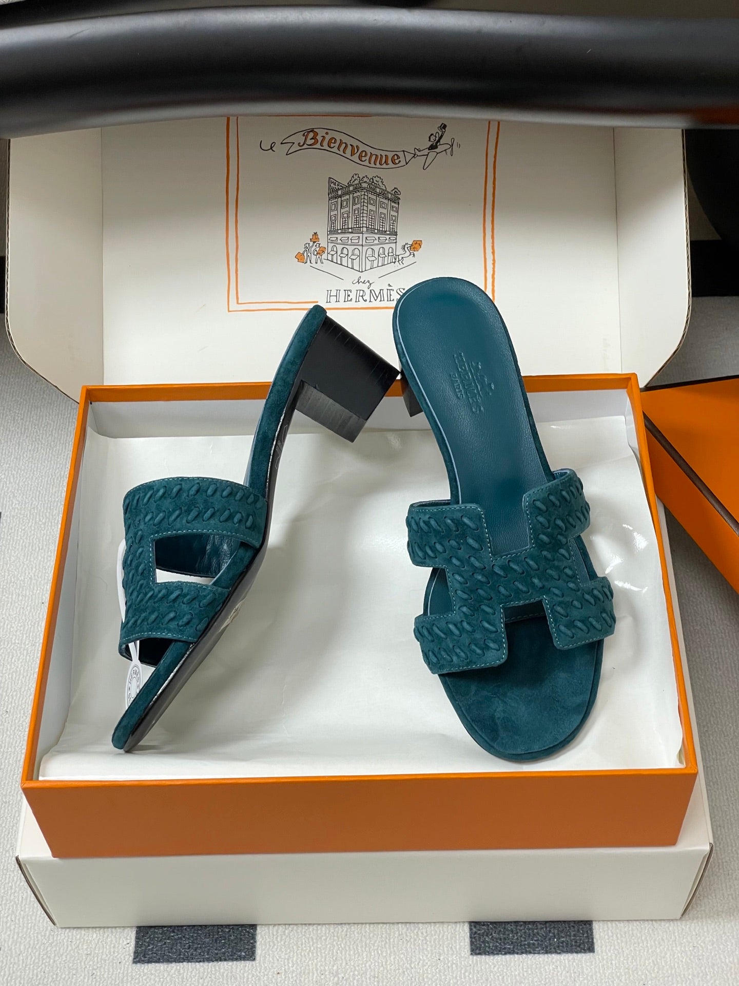 HERMES 25S ORAN HIGH‑HEEL SANDAL IN DARK BLUE SUEDE AND LAMBSKIN