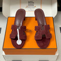 HERMES 25S ORAN HIGH‑HEEL SANDAL IN DARK RED SUEDE AND LAMBSKIN