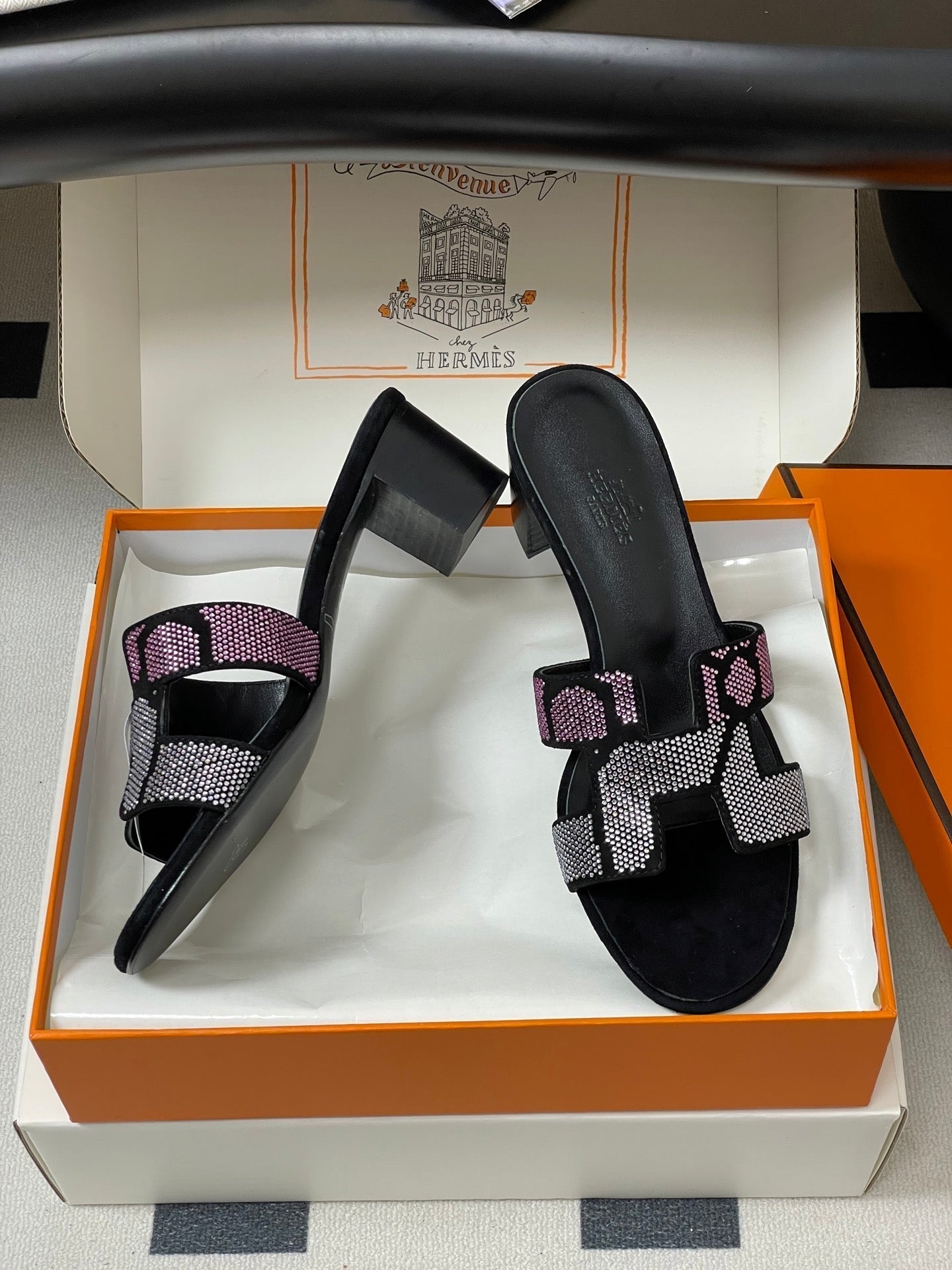 HERMES 25S ORAN HIGH‑HEEL SANDAL 50 MM IN BLACK LAMBSKIN WITH WHITE MIX PINK STONE DETAILS