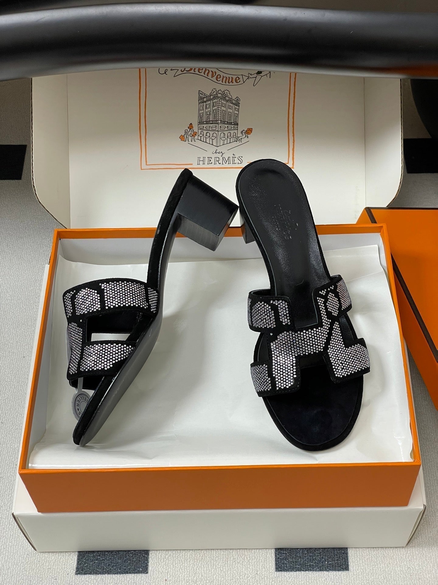 HERMES 25S ORAN HIGH‑HEEL SANDAL 50 MM IN BLACK LAMBSKIN WITH WHITE STONE DETAILS