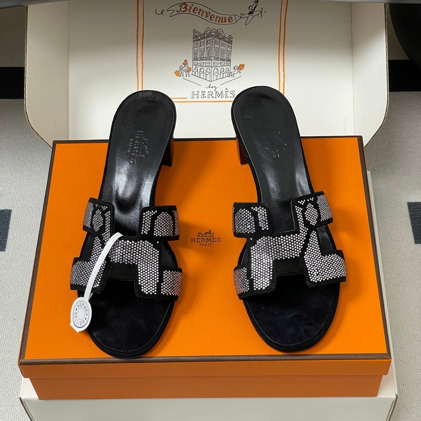 HERMES 25S ORAN HIGH‑HEEL SANDAL 50 MM IN BLACK LAMBSKIN WITH WHITE STONE DETAILS