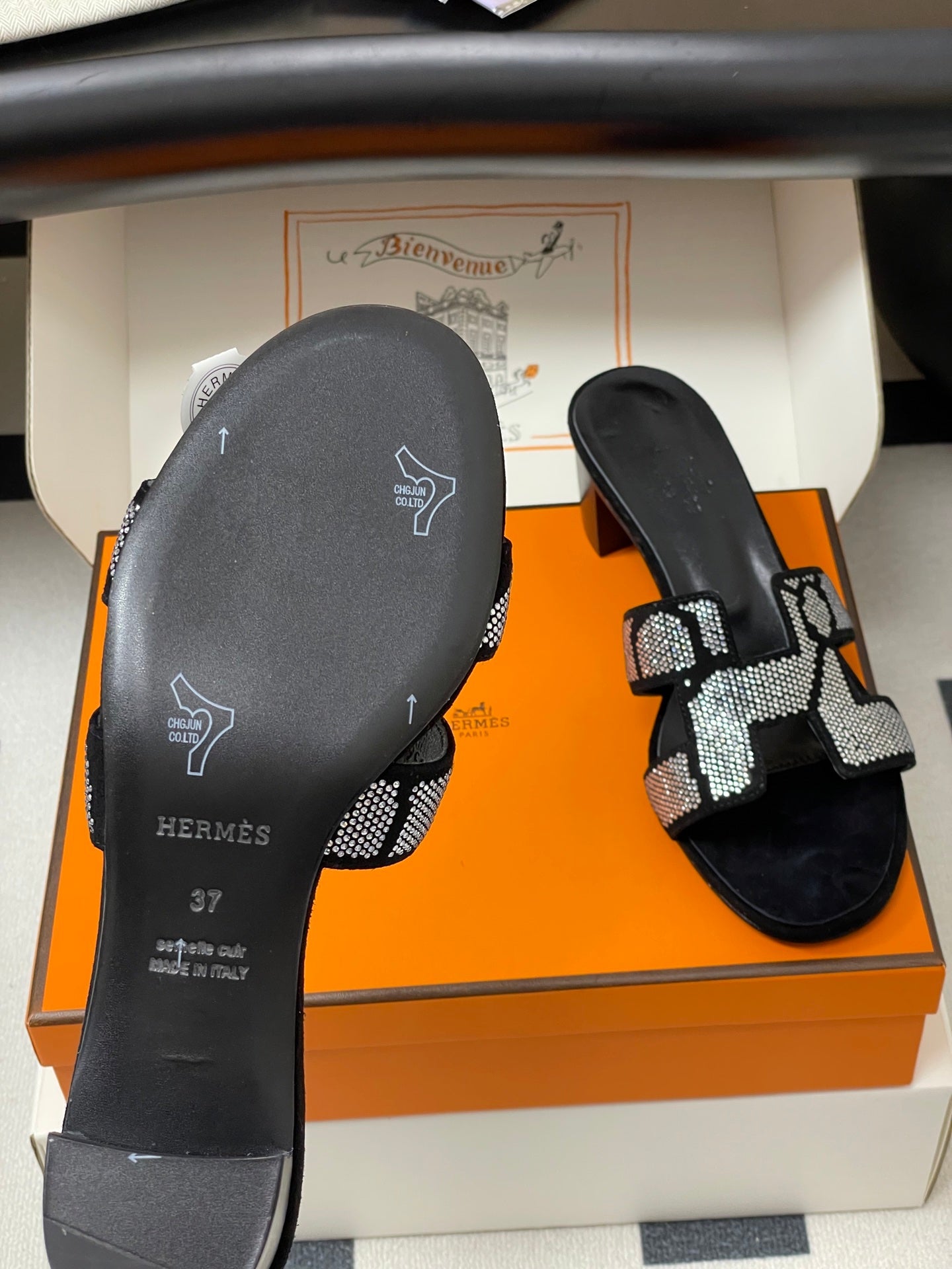HERMES 25S ORAN HIGH‑HEEL SANDAL 50 MM IN BLACK LAMBSKIN WITH WHITE STONE DETAILS