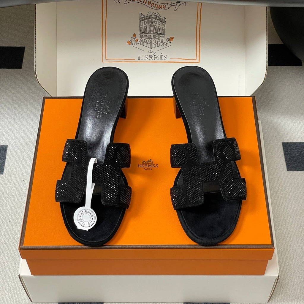 HERMES 25S ORAN HIGH‑HEEL SANDAL 50 MM IN BLACK LAMBSKIN WITH STONE DETAILS