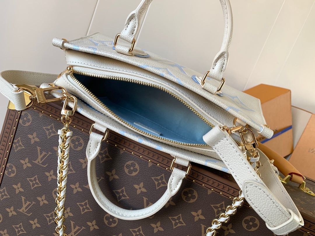 LOUIS VUITTON LV 25S ONTHEGO EAST WEST BAG 25 IN WHITE BLUE CALFSKIN MONOGRAM EMPREINTE