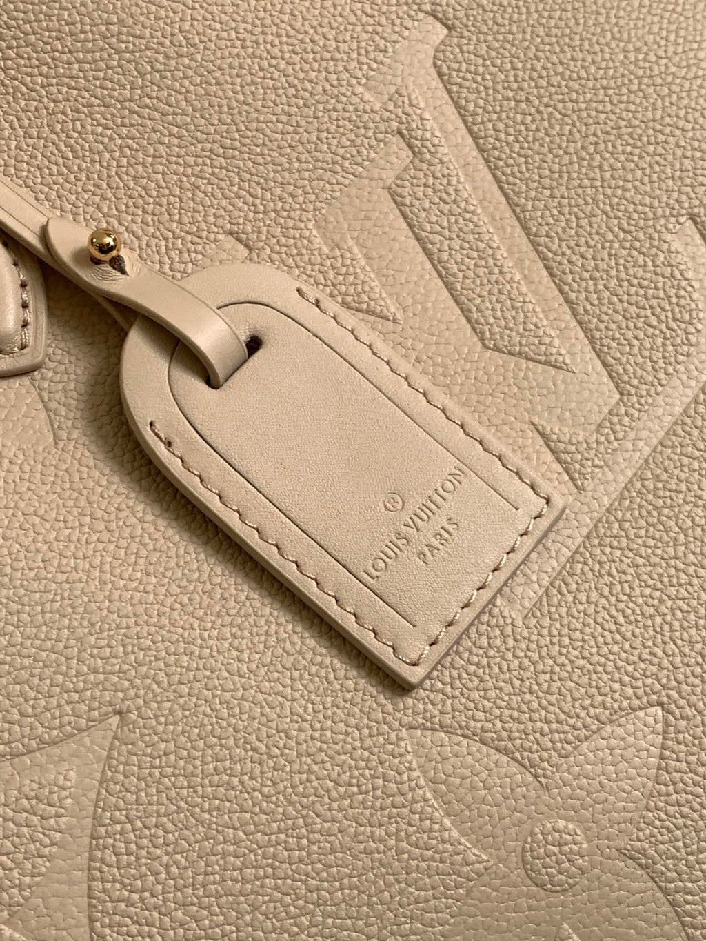 LOUIS VUITTON ONTHEGO 35 IN LIGHT BEIGE MONOGRAM CALFSKIN