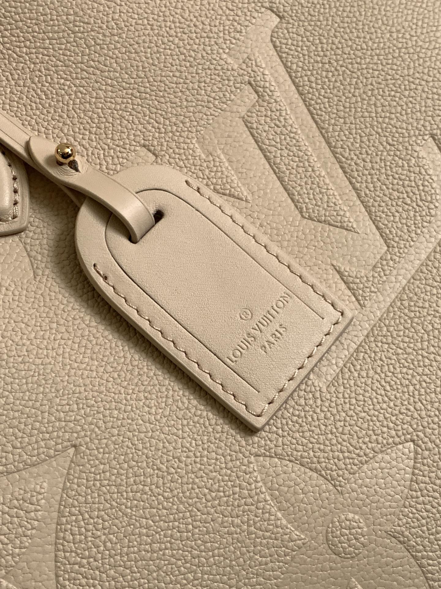 LOUIS VUITTON ONTHEGO 35 IN LIGHT BEIGE MONOGRAM CALFSKIN