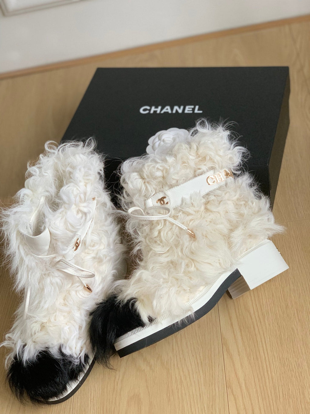 CHANEL ANKLE BOOTS IN WHITE MIX BLACK WOOL FUR