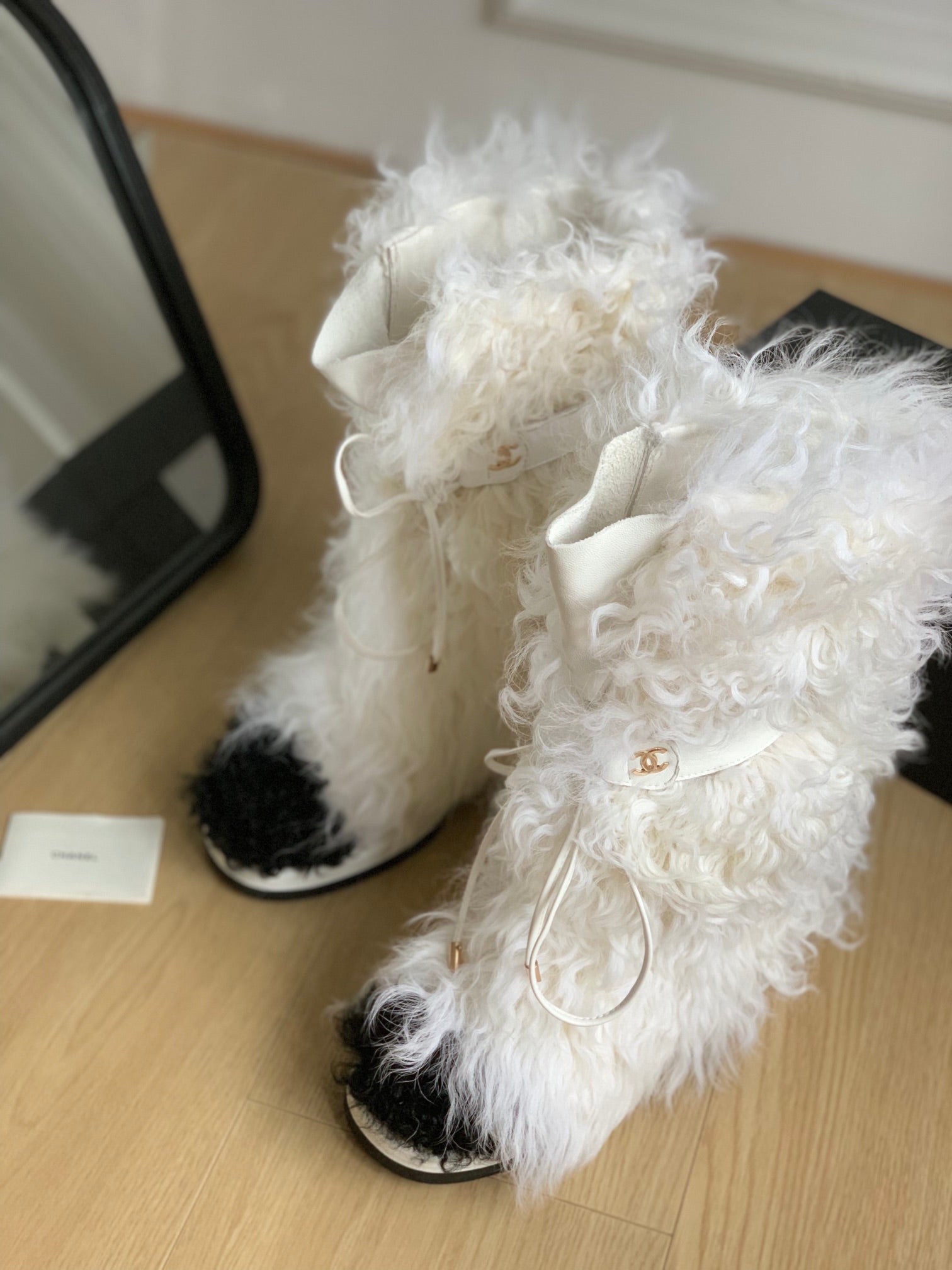 CHANEL ANKLE HIGH BOOTS IN WHITE MIX BLACK WOOL FUR