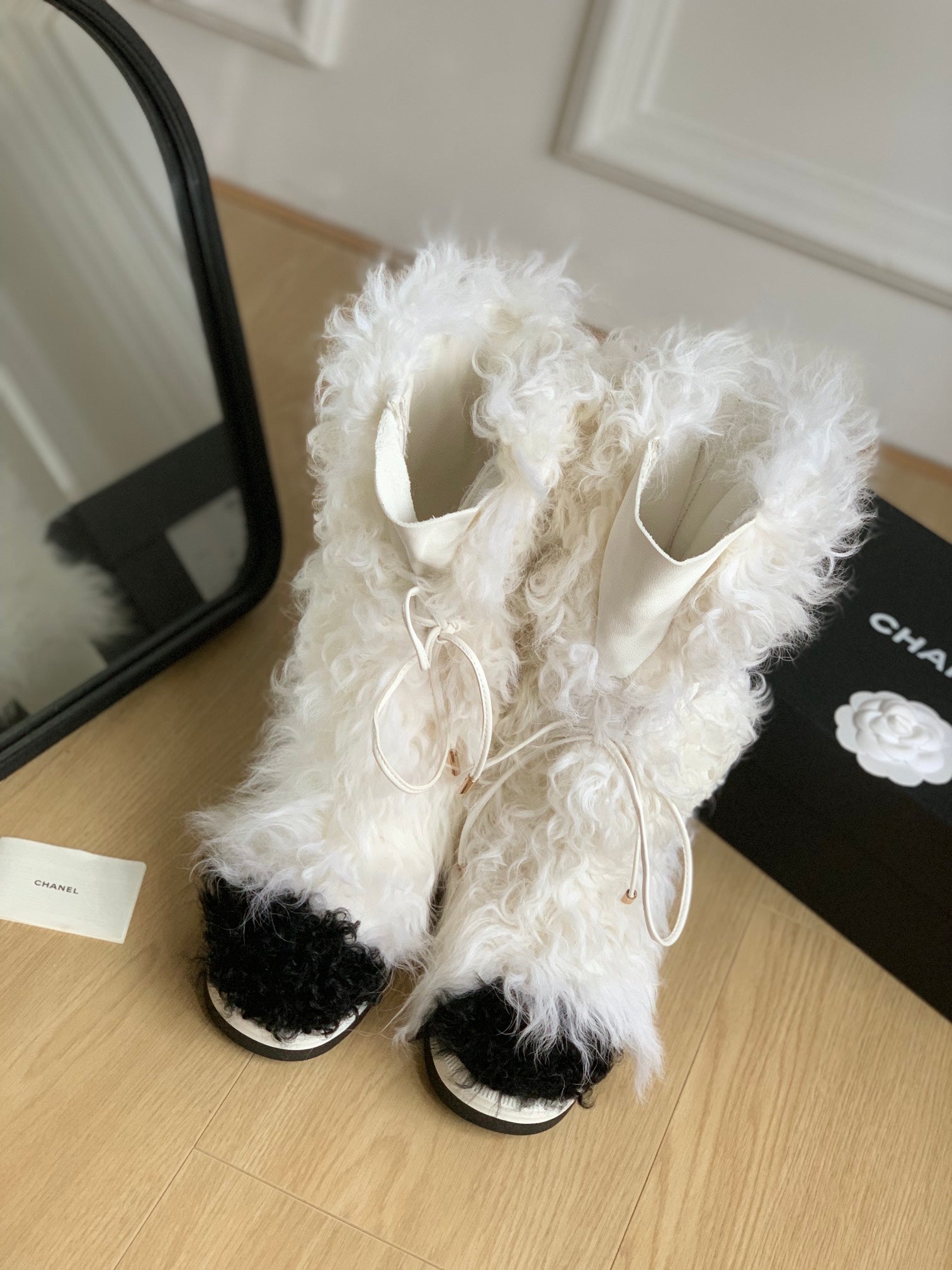 CHANEL ANKLE HIGH BOOTS IN WHITE MIX BLACK WOOL FUR