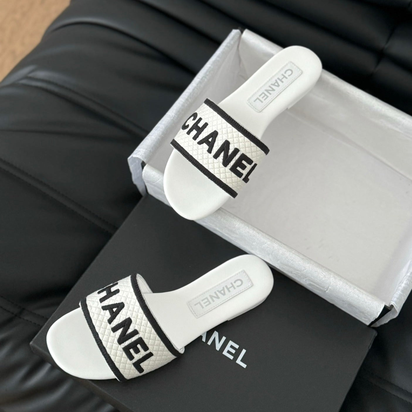 CHANEL Woven Embroidered Letter Slippers White Black