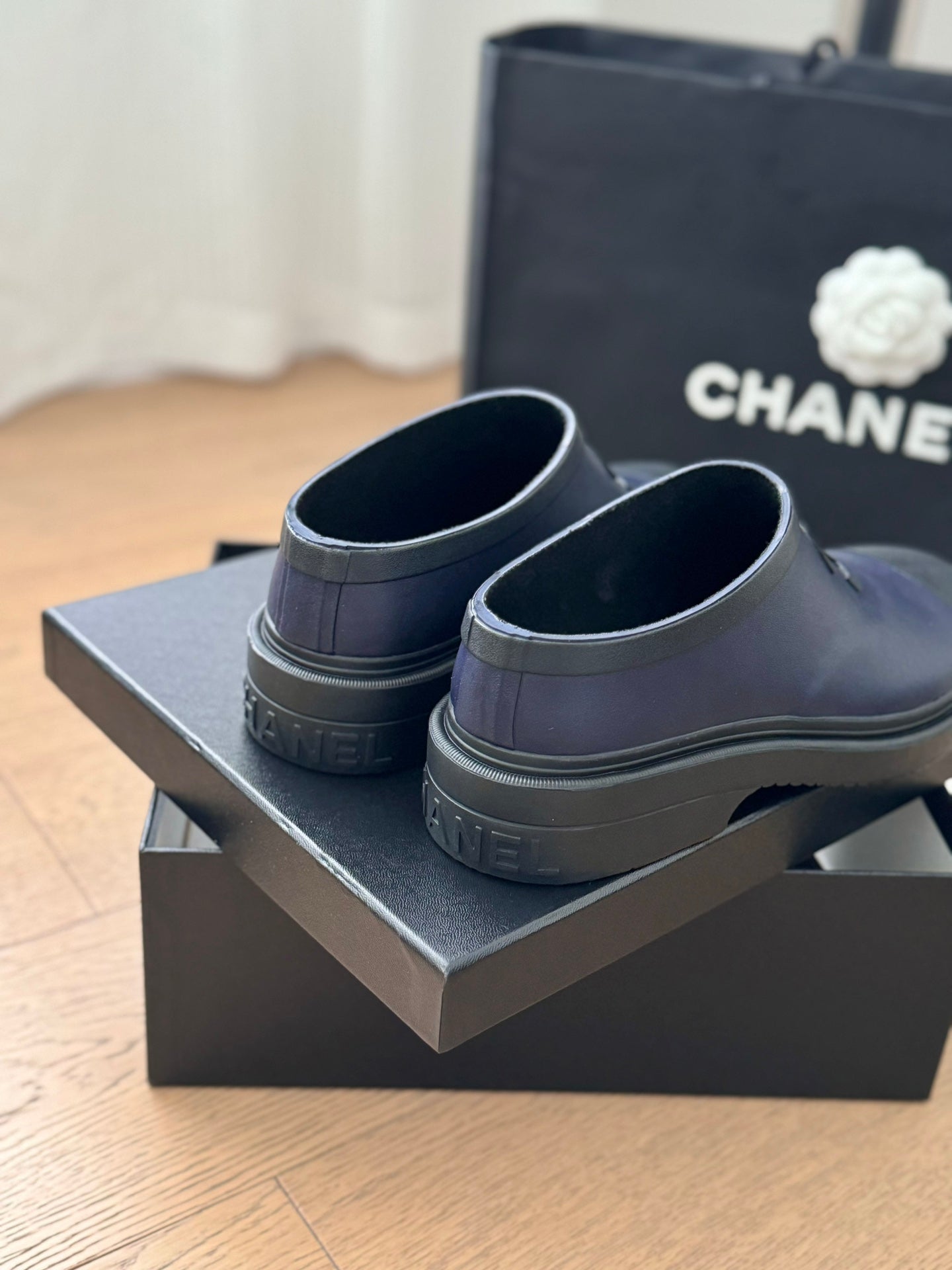 CHANEL SHORT BOOTS IN MID-NIGHT BLUE RUBBER