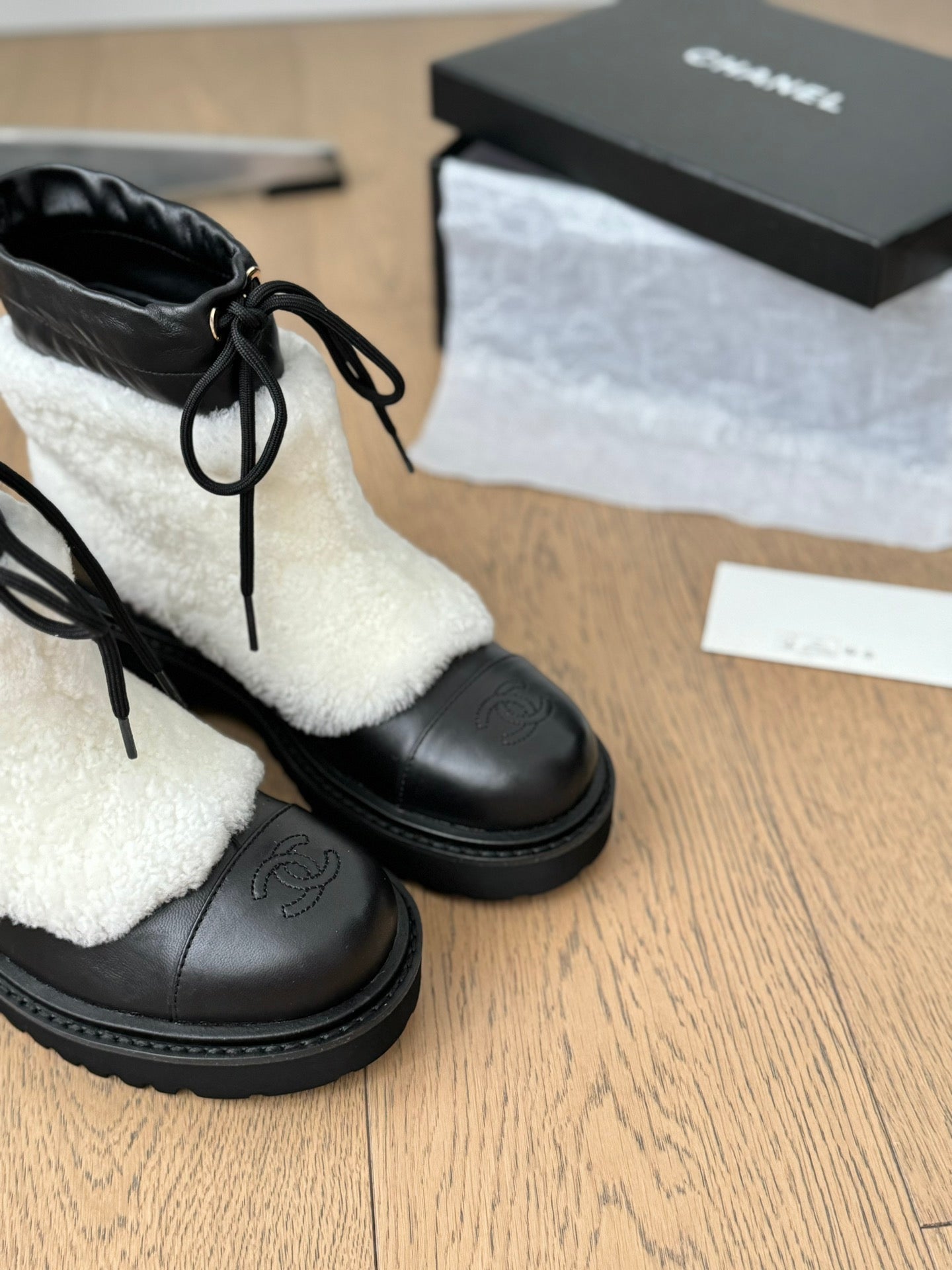 CHANEL CHUNKY BOOTS IN WHITE SMOOTH FLEECE AND BLACK CALFSKIN