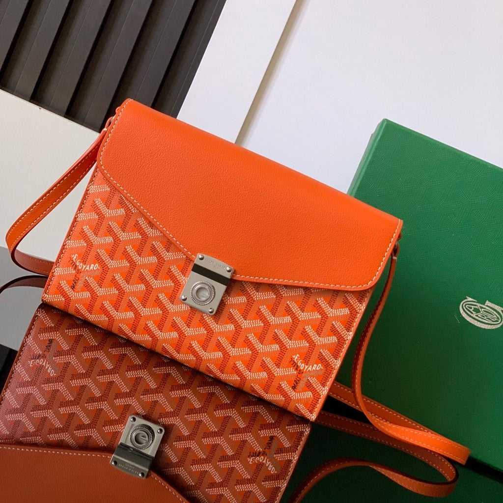 CHYPRE WALLET-POUCH 21 IN ORANGE GOYARDINE CANVAS AND CALFSKIN
