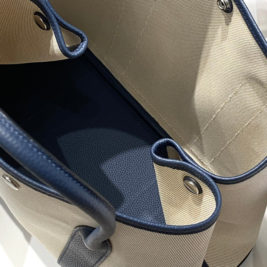HERMES GARDEN PARTY 36 IN NAVY CREAM TOILE H CANVAS BLUE MARINE CALFSKIN ABSTRACT BEAR FACE PRINT