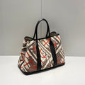 HERMES GARDEN PARTY 36 IN BEIGE ORANGE AND BROWN TOILE H CANVAS BLACK CALFSKIN HORSE TOTEM PRINT