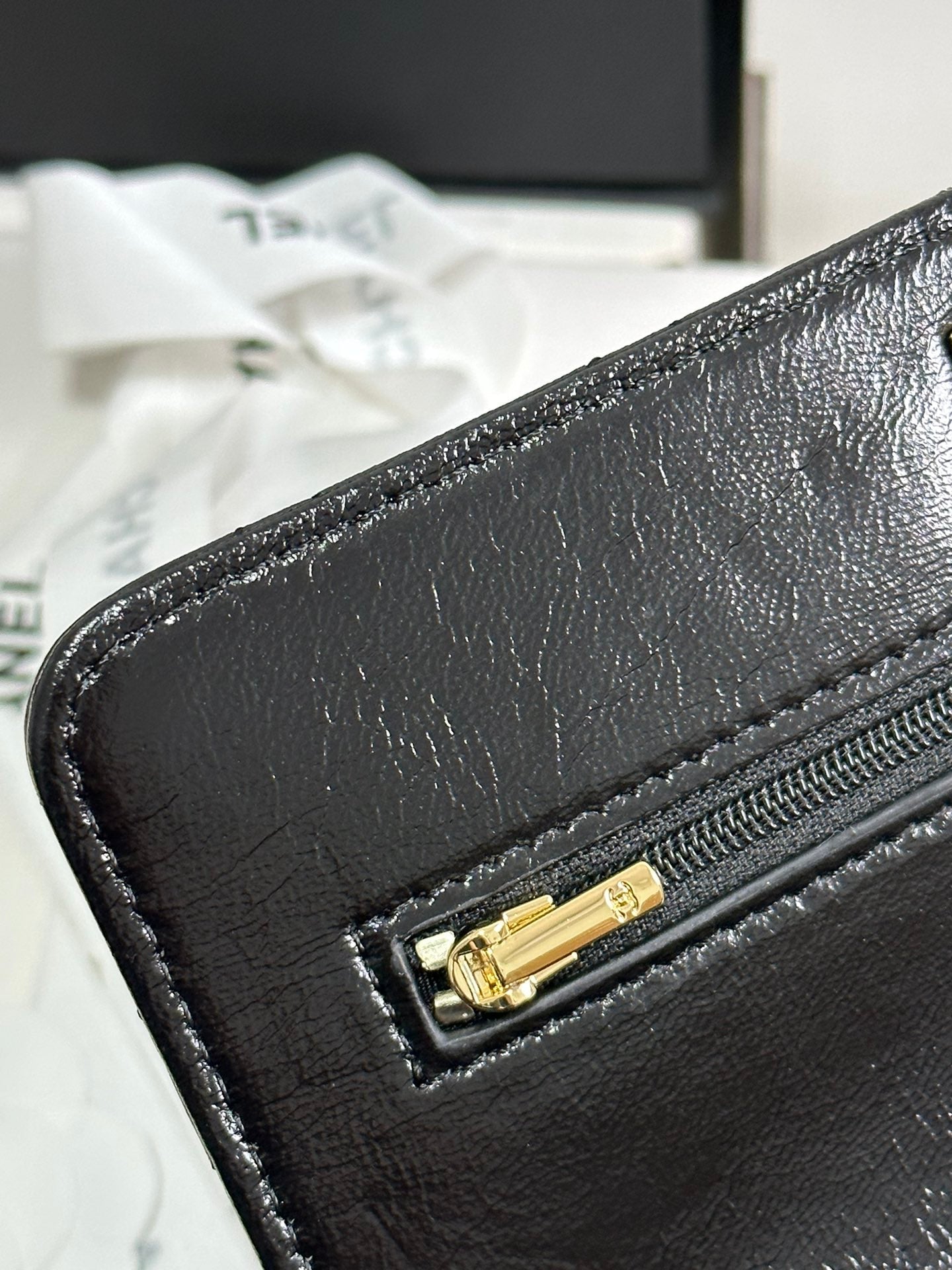 CHANEL PEARL HANDLE FLAP BAG 18 IN BLACK SHINY LAMBSKIN