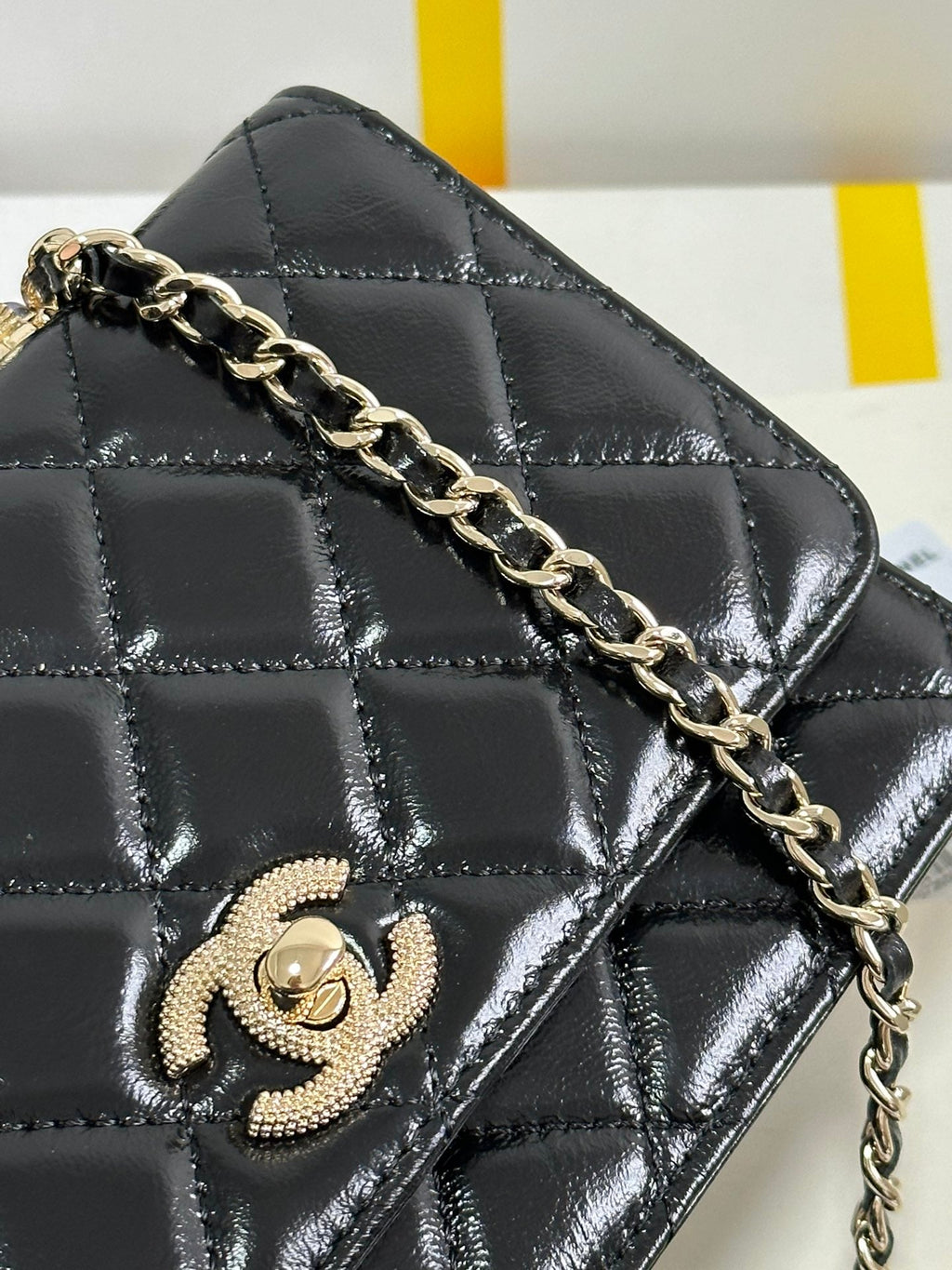CHANEL PEARL HANDLE FLAP BAG 18 IN BLACK SHINY LAMBSKIN