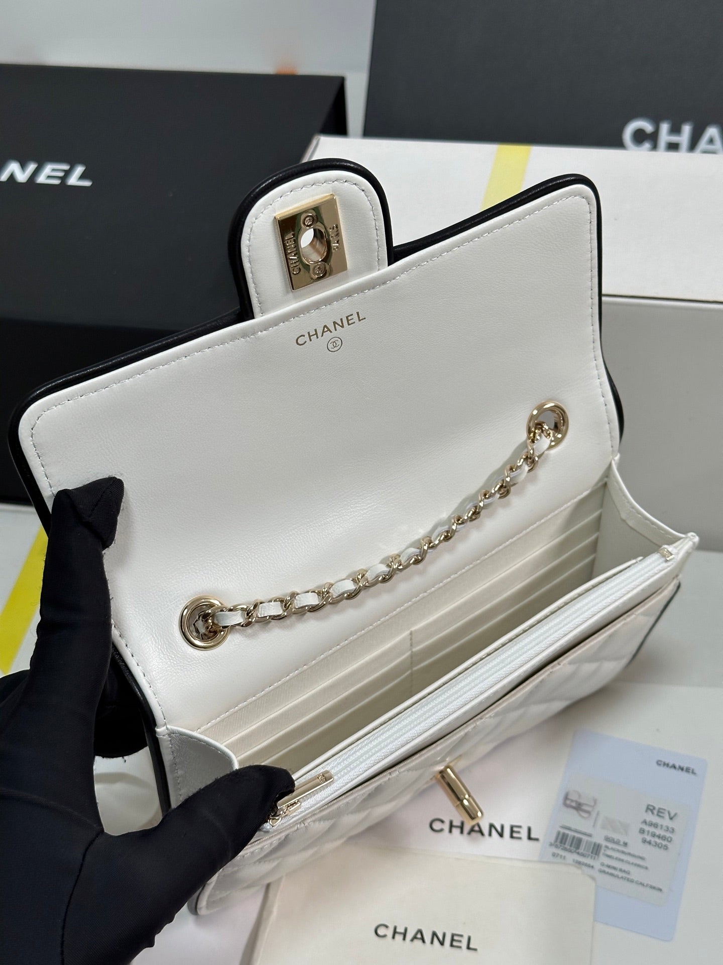 CHANEL QUILTED FLAP BAG WITH BLACK TRIM 19 IN WHITE LAMBSKIN