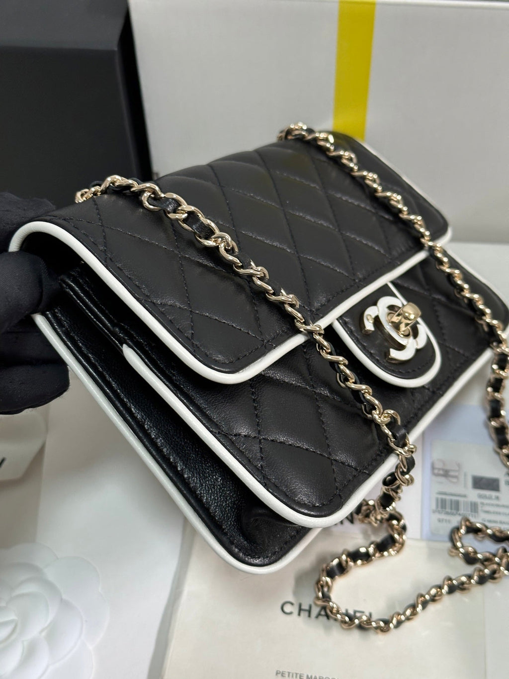 CHANEL QUILTED FLAP BAG WITH WHITE TRIM 19 IN BLACK LAMBSKIN