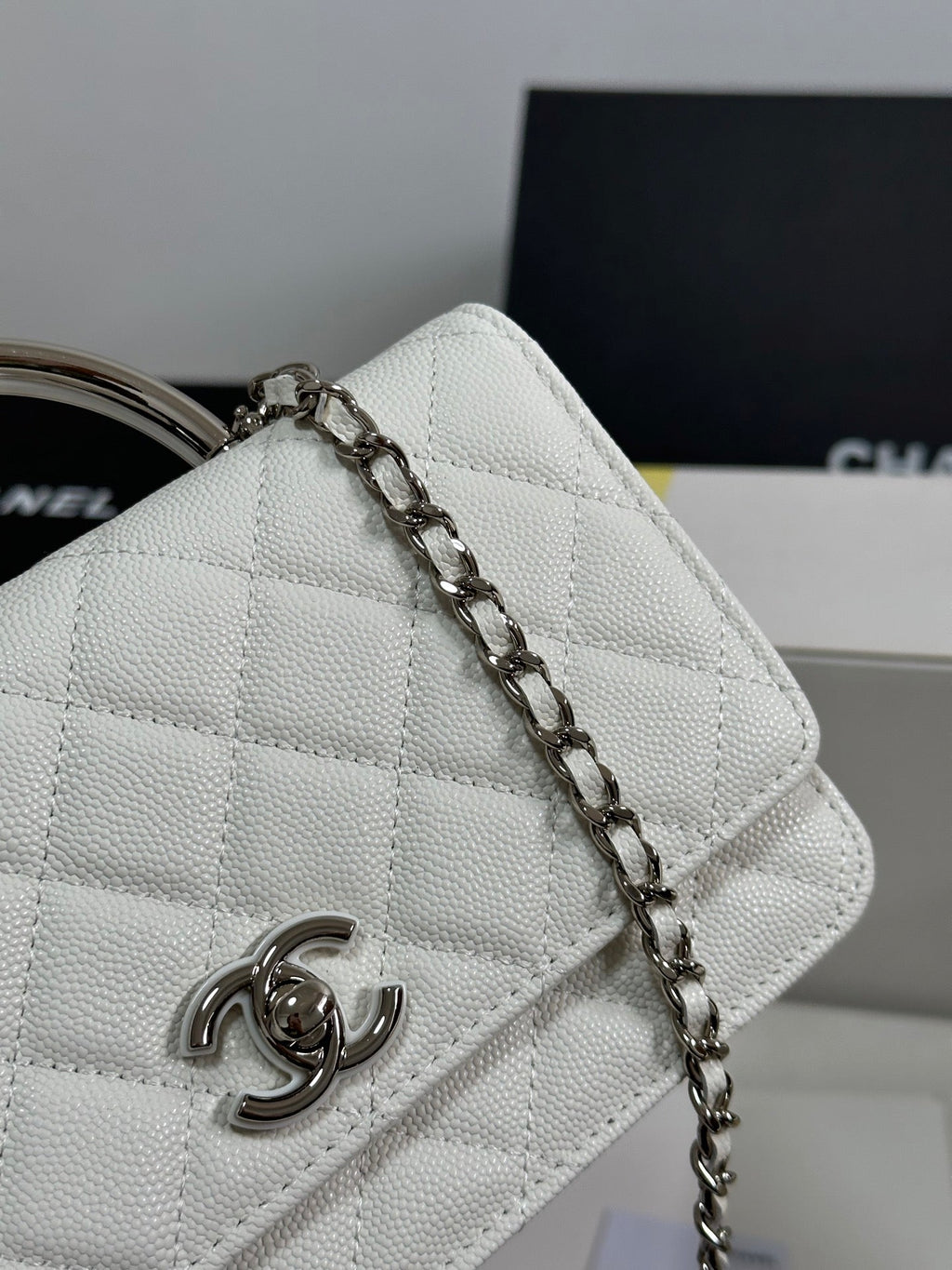 CHANEL FLAP BAG WITH SILVER-TONE HANDLE 19 IN WHITE CAVIAR SKIN