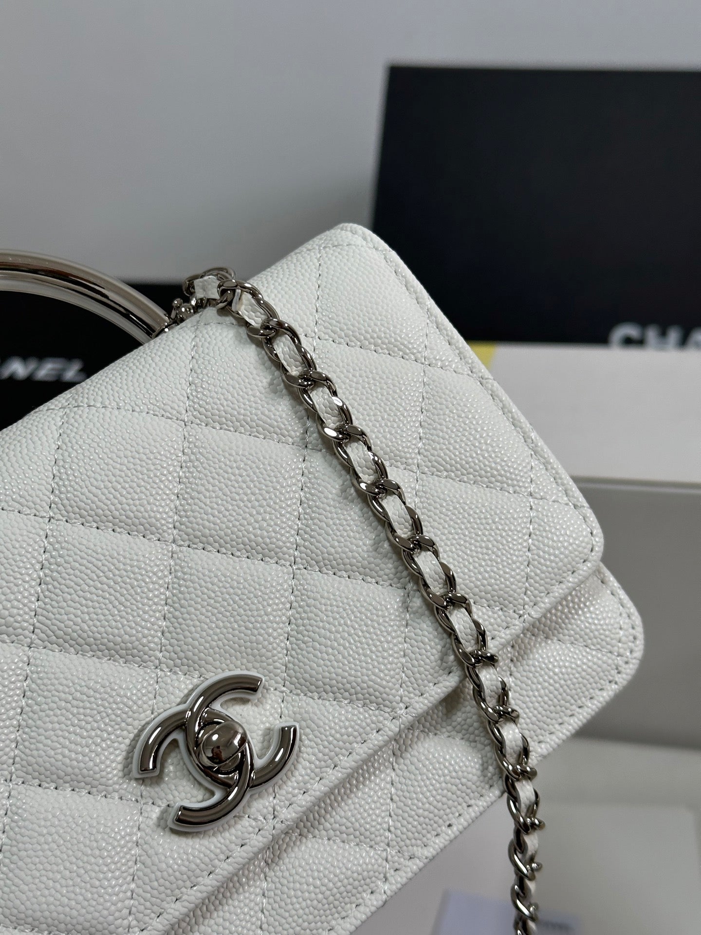 CHANEL FLAP BAG WITH SILVER-TONE HANDLE 19 IN WHITE CAVIAR SKIN