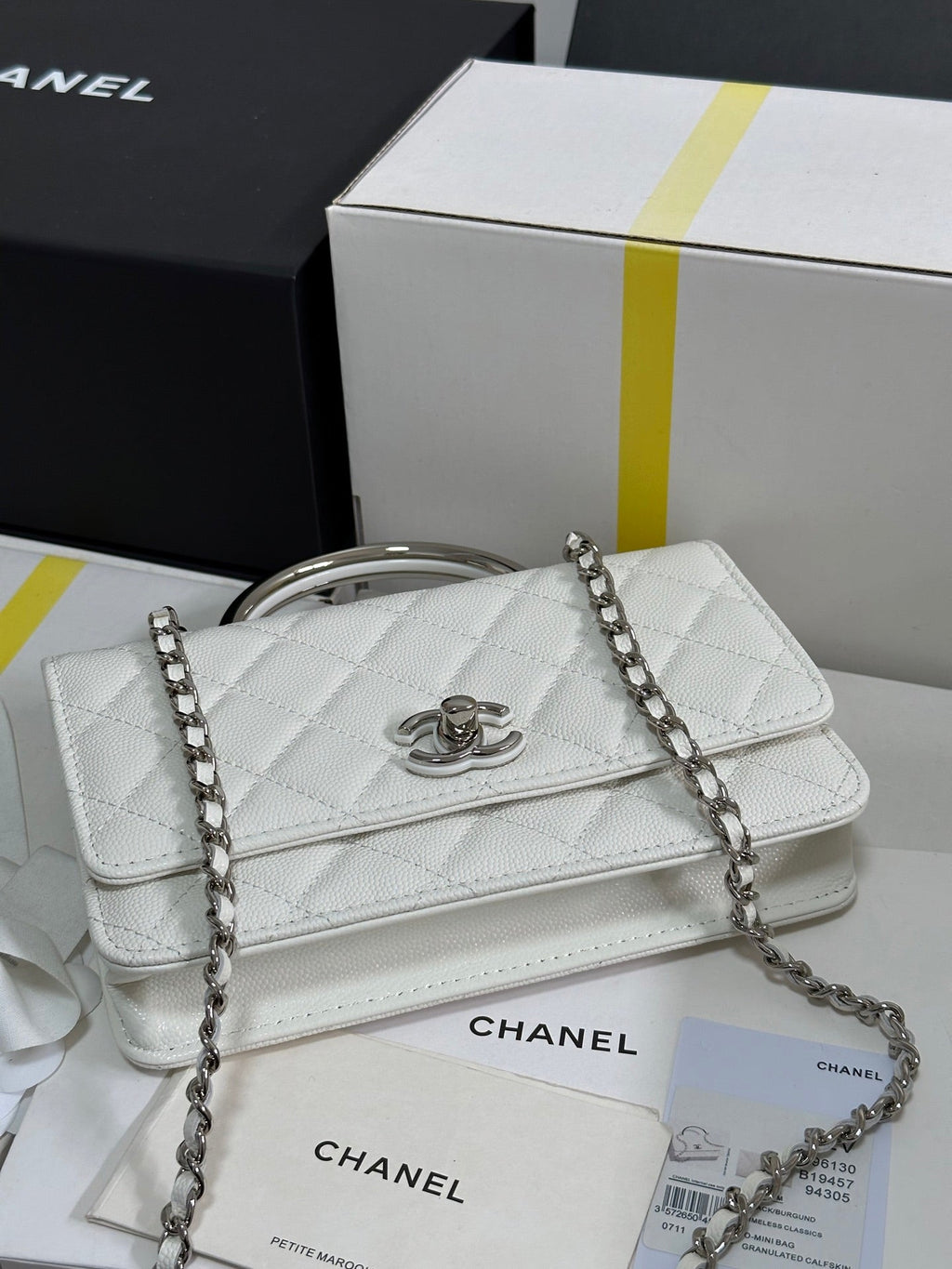 CHANEL FLAP BAG WITH SILVER-TONE HANDLE 19 IN WHITE CAVIAR SKIN