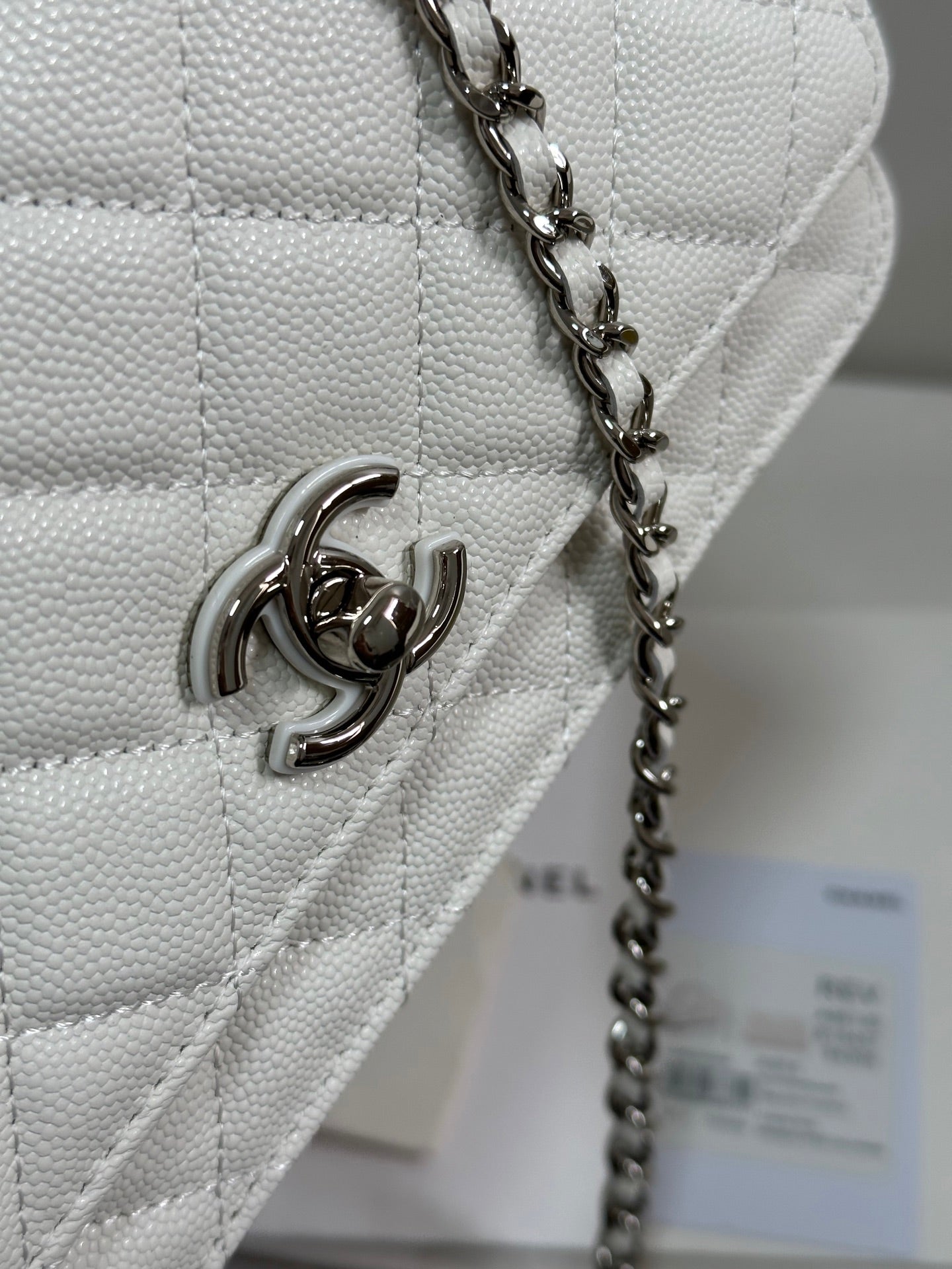 CHANEL FLAP BAG WITH SILVER-TONE HANDLE 19 IN WHITE CAVIAR SKIN