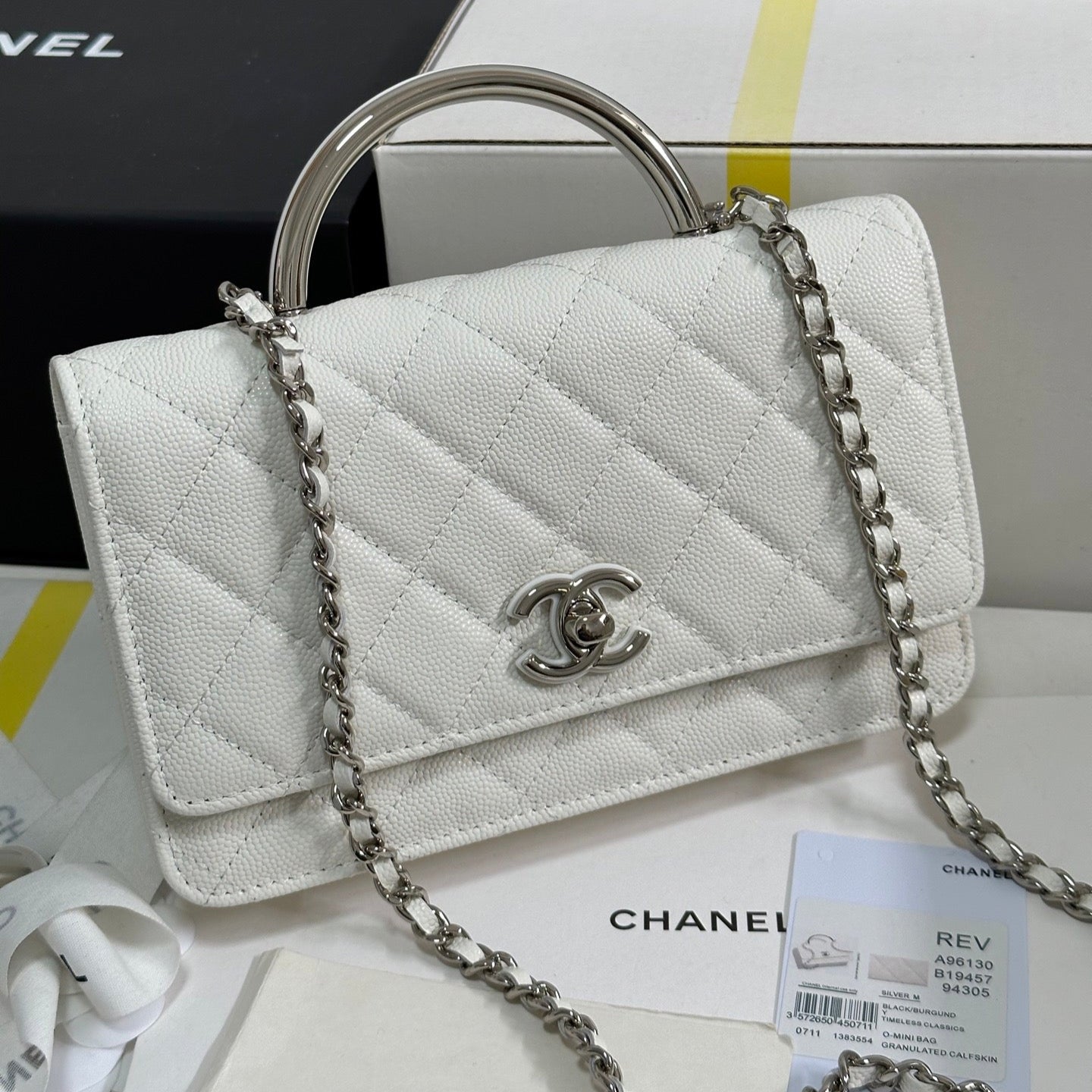 CHANEL FLAP BAG WITH SILVER-TONE HANDLE 19 IN WHITE CAVIAR SKIN