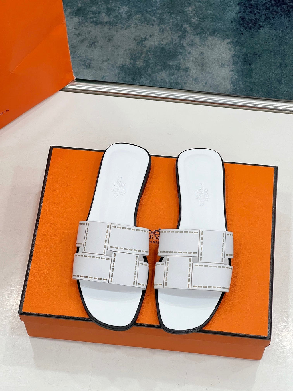 HERMES IDIOMA SANDAL IN WHITE CALFSKIN