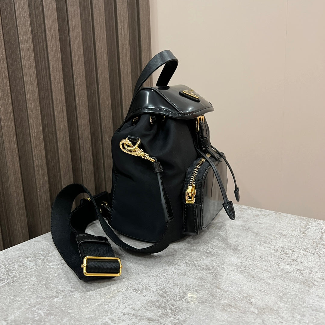 PRADA MINI BACKPACK 18 IN BLACK RE-NYLON AND GLOSSY CALFSKIN GOLD HARDWARE