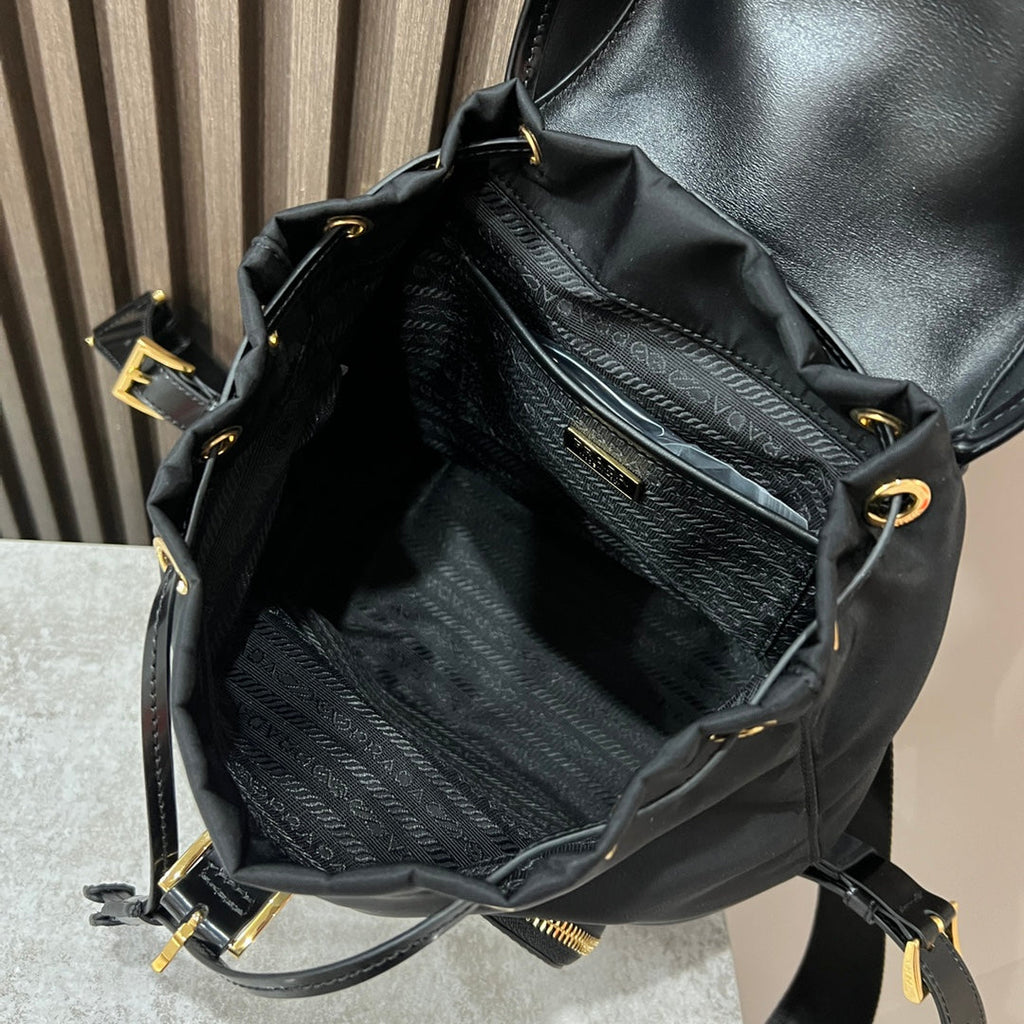 PRADA BACKPACK 25 IN BLACK RE-NYLON AND GLOSSY CALFSKIN GOLD HARDWARE