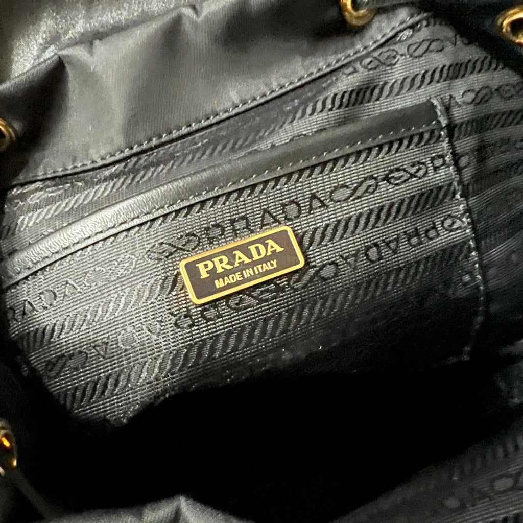 PRADA BACKPACK 25 IN BLACK RE-NYLON AND GLOSSY CALFSKIN GOLD HARDWARE