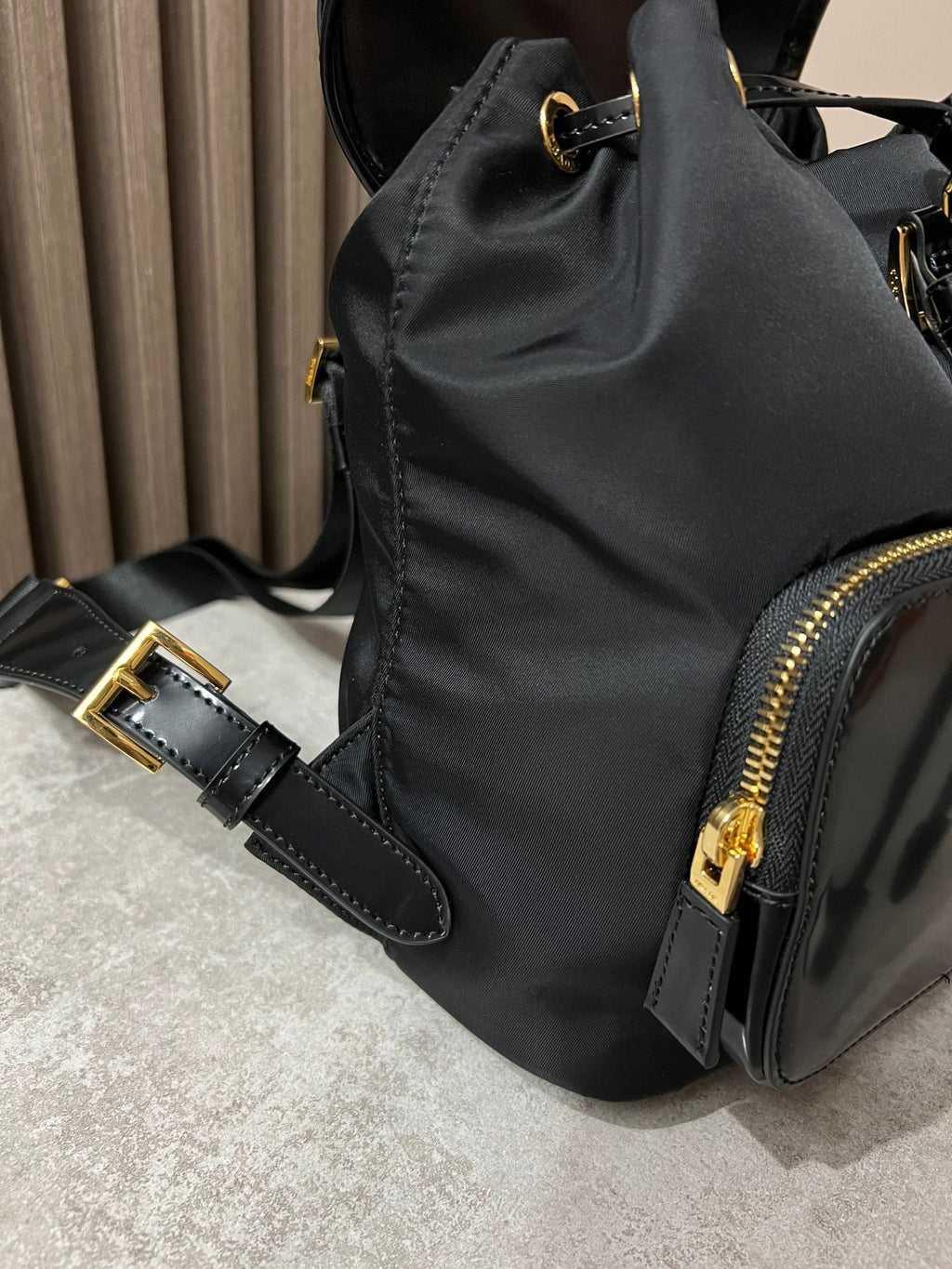 PRADA BACKPACK 25 IN BLACK RE-NYLON AND GLOSSY CALFSKIN GOLD HARDWARE