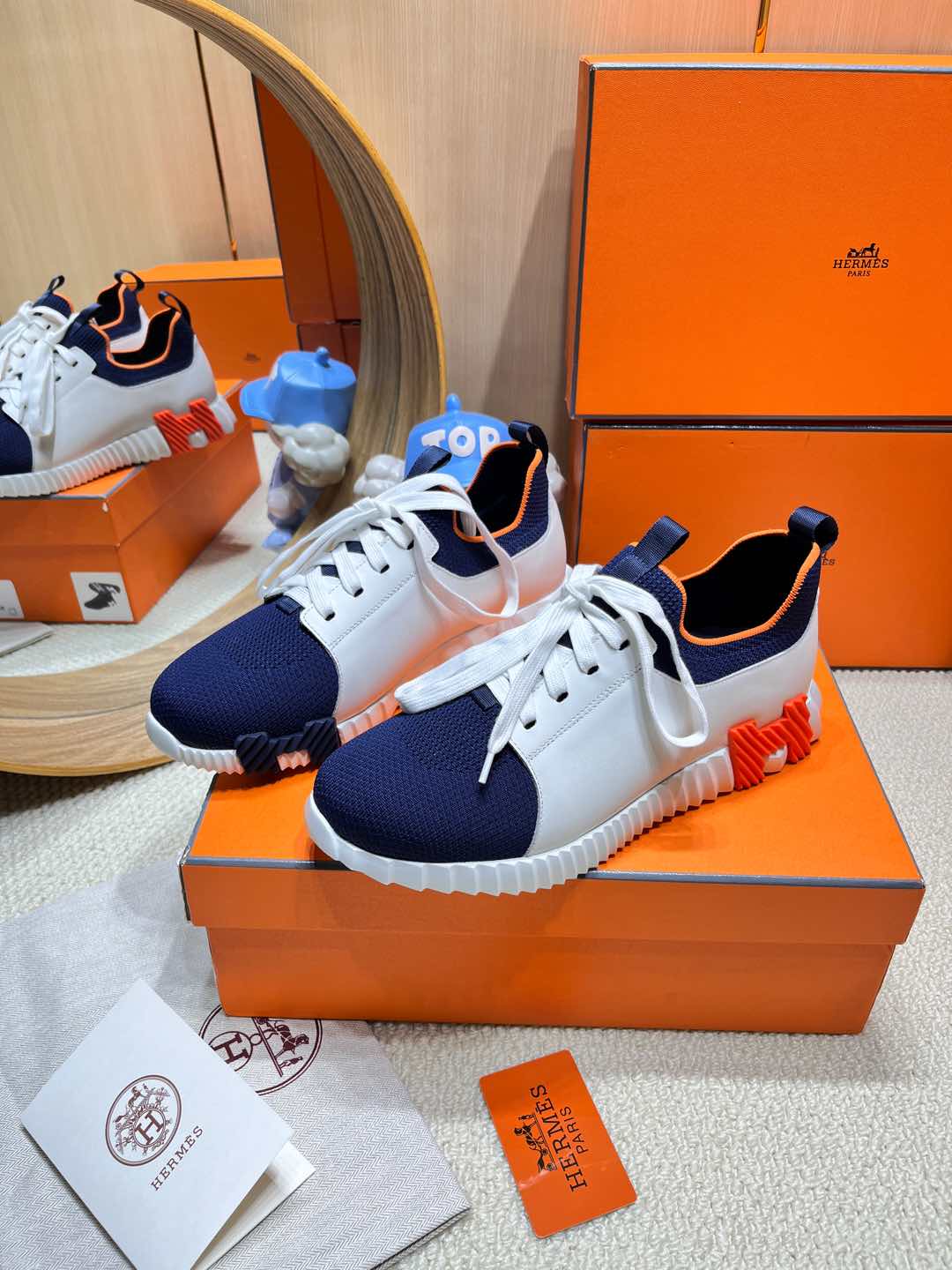 HERMES DEPART SLIP-ON SNEAKER IN NAVY BLUE KNIT AND WHITE CALFSKIN