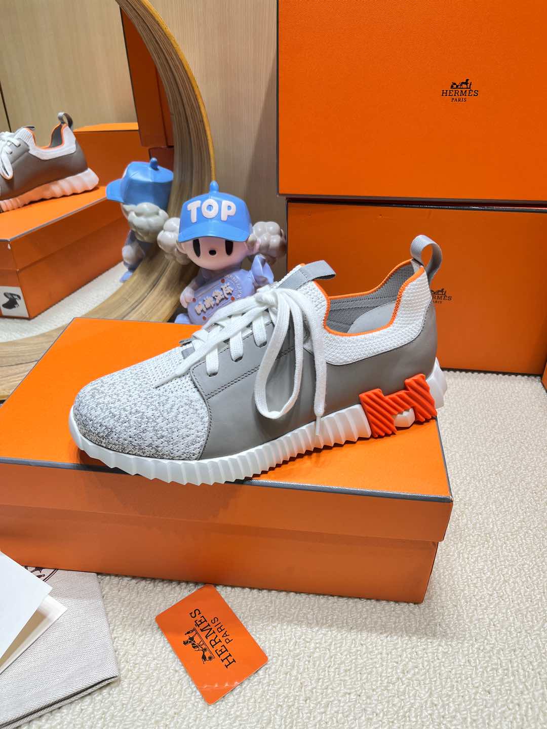 HERMES DEPART SLIP-ON SNEAKER IN WHITE MIX MOUSE GRAY KNIT AND CALFSKIN