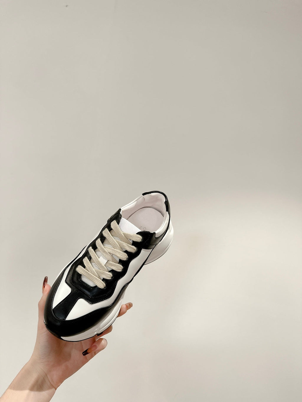 GUCCI RHYTON TRAINER BLACK AND WHITE CALFSKIN