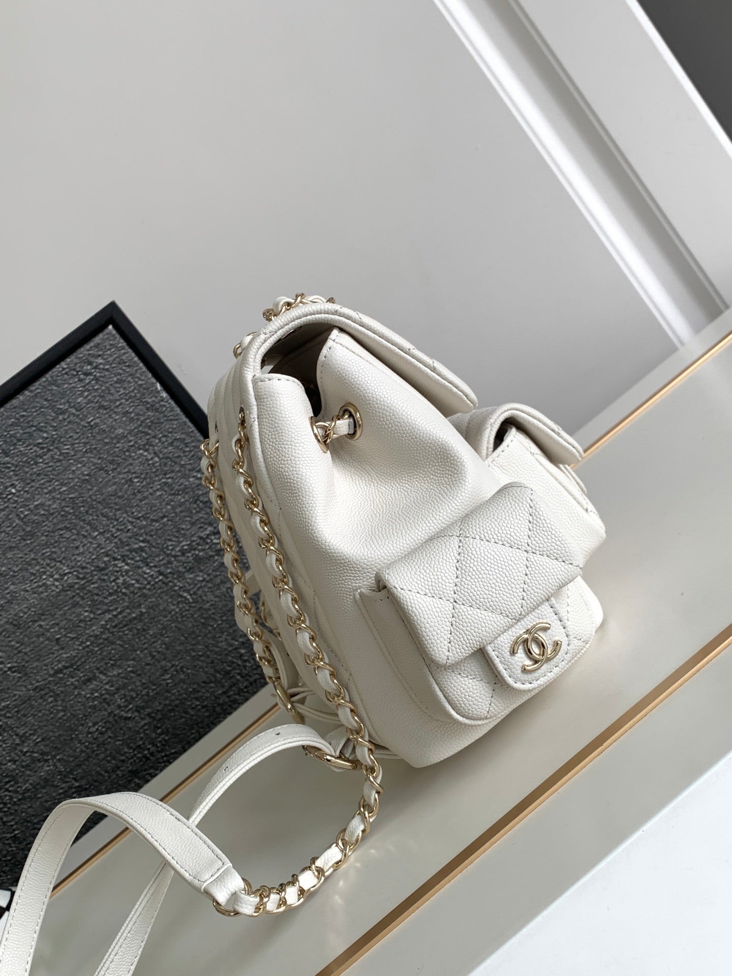 CHANEL DUMA BACKPACK 21 IN WHITE CALFSKIN