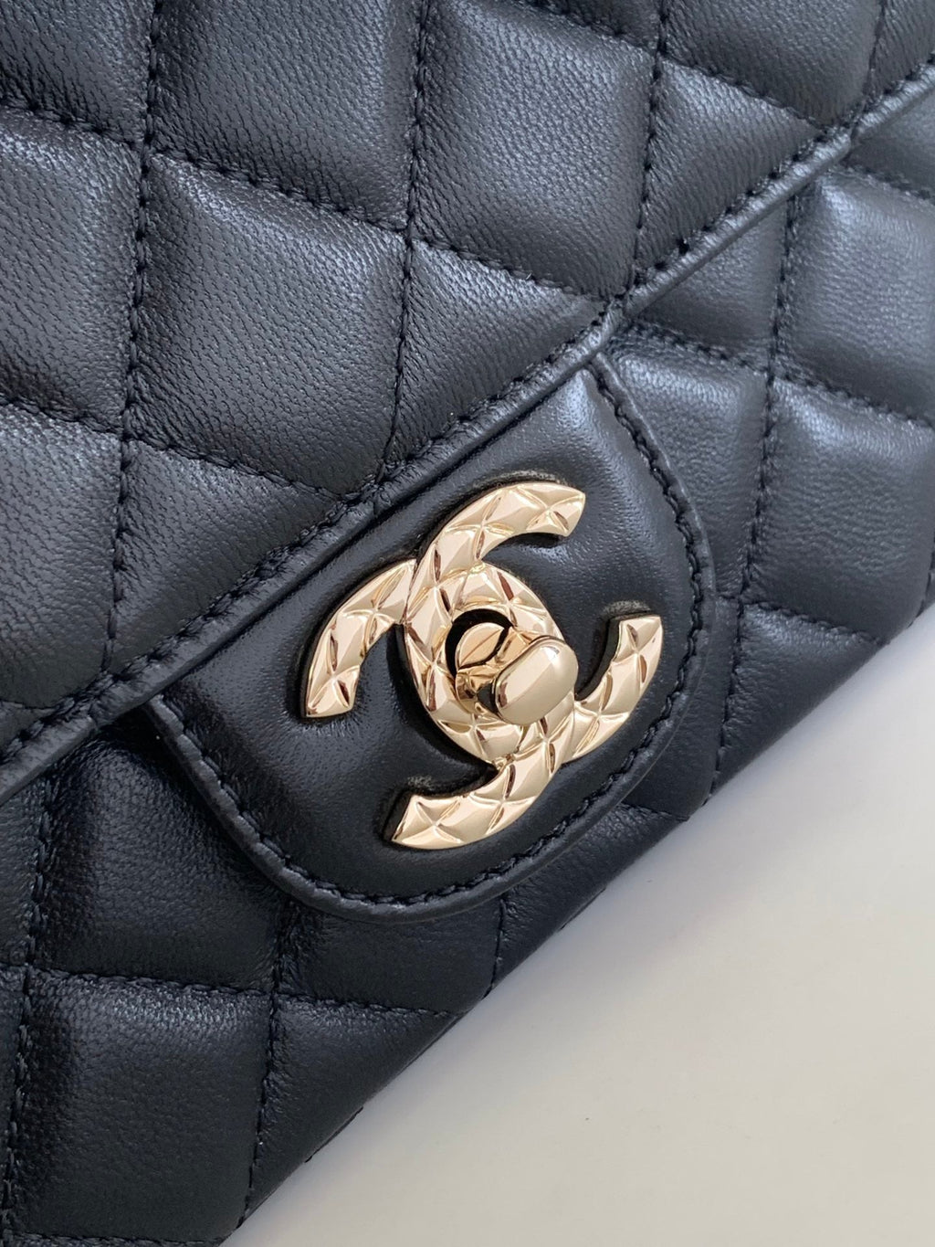 CHANEL MINI 20 FLAP BAG IN BLACK CALFSKIN