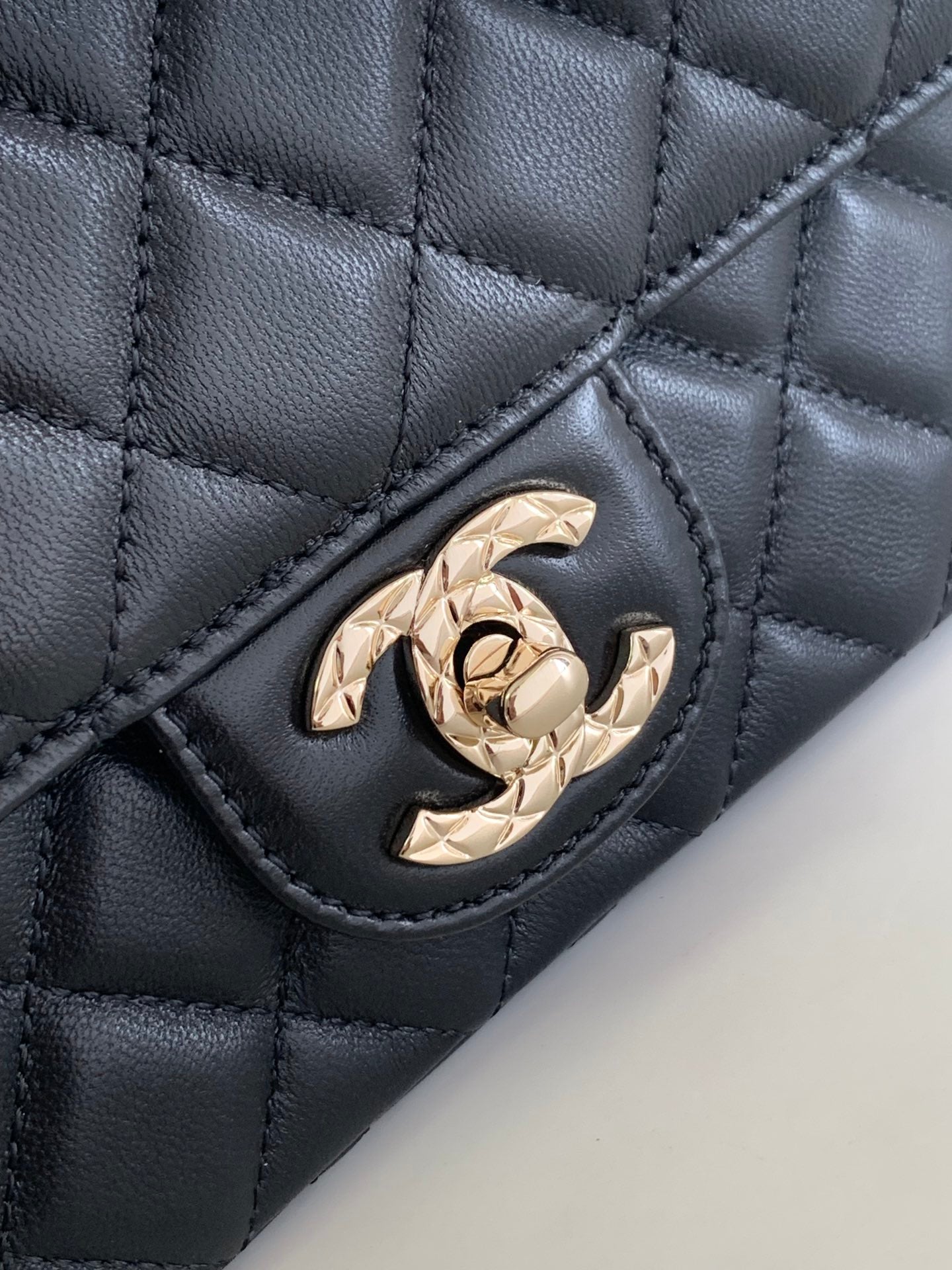 CHANEL MINI 20 FLAP BAG IN BLACK CALFSKIN