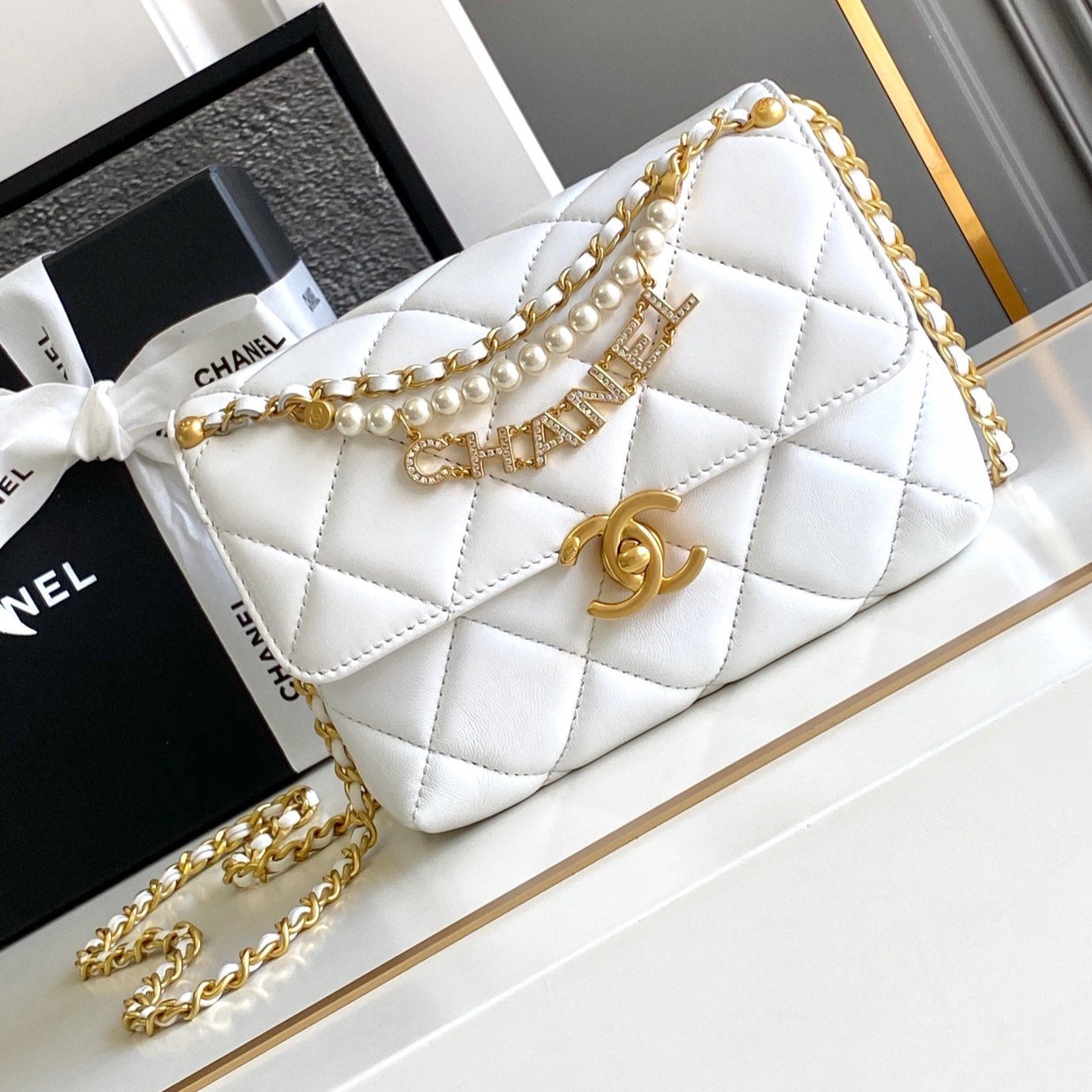 CHANEL MINI 20 FLAP BAG IN WHITE LAMBSKIN GOLD HARDWARE