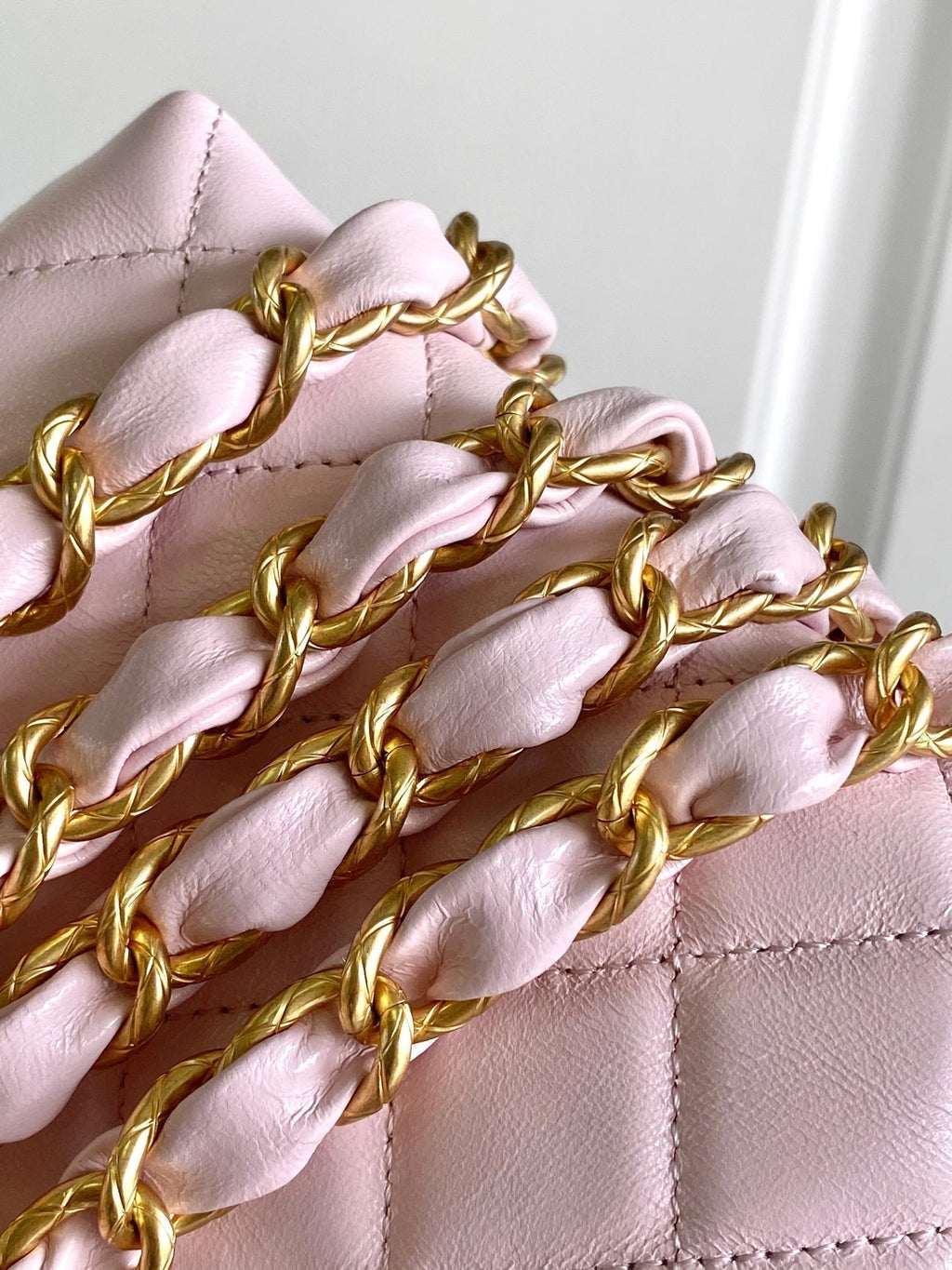 CHANEL MINI 13 CLUTCH WITH STRAP IN LIGHT PINK LAMBSKIN ATTACH BOW