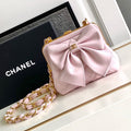 CHANEL MINI 13 CLUTCH WITH STRAP IN LIGHT PINK LAMBSKIN ATTACH BOW